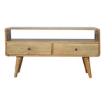A natural finish Hamade TV stand with an open shelf and two drawers with brass knobs, made from solid mango wood.