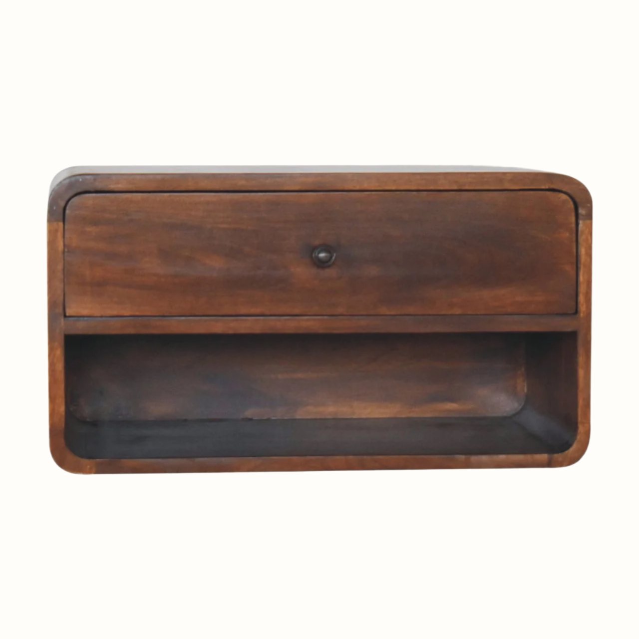 A wall-mounted bedside table made of mango wood in a chestnut finish, featuring an open slot shelf and a drawer with a brass knob.