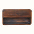 A wall-mounted bedside table made of mango wood in a chestnut finish, featuring an open slot shelf and a drawer with a brass knob.