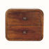 A small chestnut-colored floating bedside table with two drawers and brass knobs, wall-mounted design.