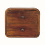 A small chestnut-colored floating bedside table with two drawers and brass knobs, wall-mounted design.