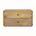 A medium-sized natural finish wall-mounted bedside table made of mango wood with two drawers and brass hardware.