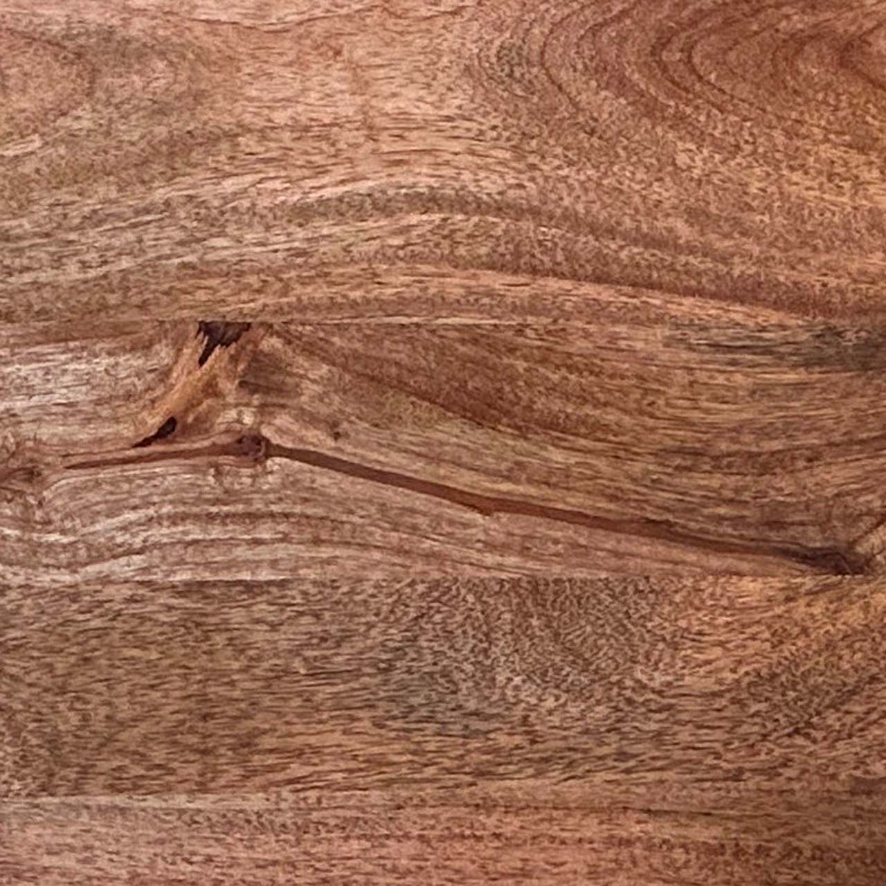 A close up photograph showing our honey caramel wood sample.