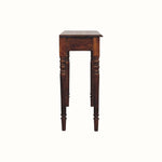 Wooden side table with turned legs on a white background