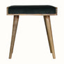 Small square tray-style bench in a green velvet, and a natural wooden body.