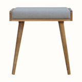 Small square tray-style bench in a grey tweed, and a natural wooden body.