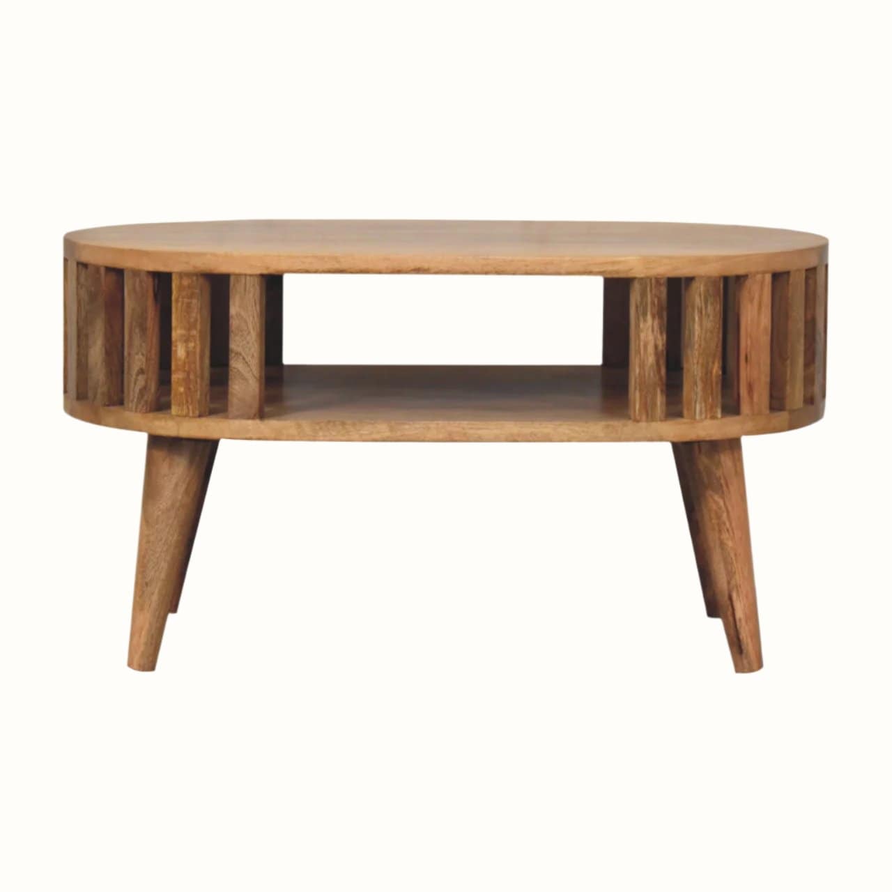 A natural stained mango wood coffee table, featuring open shelving, and slatted design. 