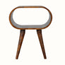 A chestnut finish bedside table with an open design and a slot shelf for storage, made from mango wood.