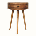 A semi-circular bedside table with a natural wood finish, featuring a single drawer and three legs.