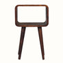 A small chestnut-colored Hamade bedside table with four Nordic-style legs and an open slot compartment.