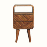Wooden side table with a chevron pattern on a white background