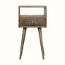 Compact Scandinavian bedside table made from solid wood in grey-wash brown finish.