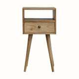 Scandinavian style bedside table made from solid wood in light brown finish.