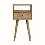Scandinavian style bedside table made from solid wood in light brown finish.