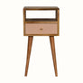 Scandinavian style bedside table made from solid wood in light brown finish, with handpainted pink drawer front.