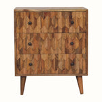A small chest of drawers with a natural wood finish and brass knobs, featuring a geometric pineapple pattern on the drawer fronts.