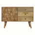 A brown sideboard with a geometric pineapple pattern on the front, featuring a large cupboard and three drawers with knobs, set on four short Nordic-style legs.