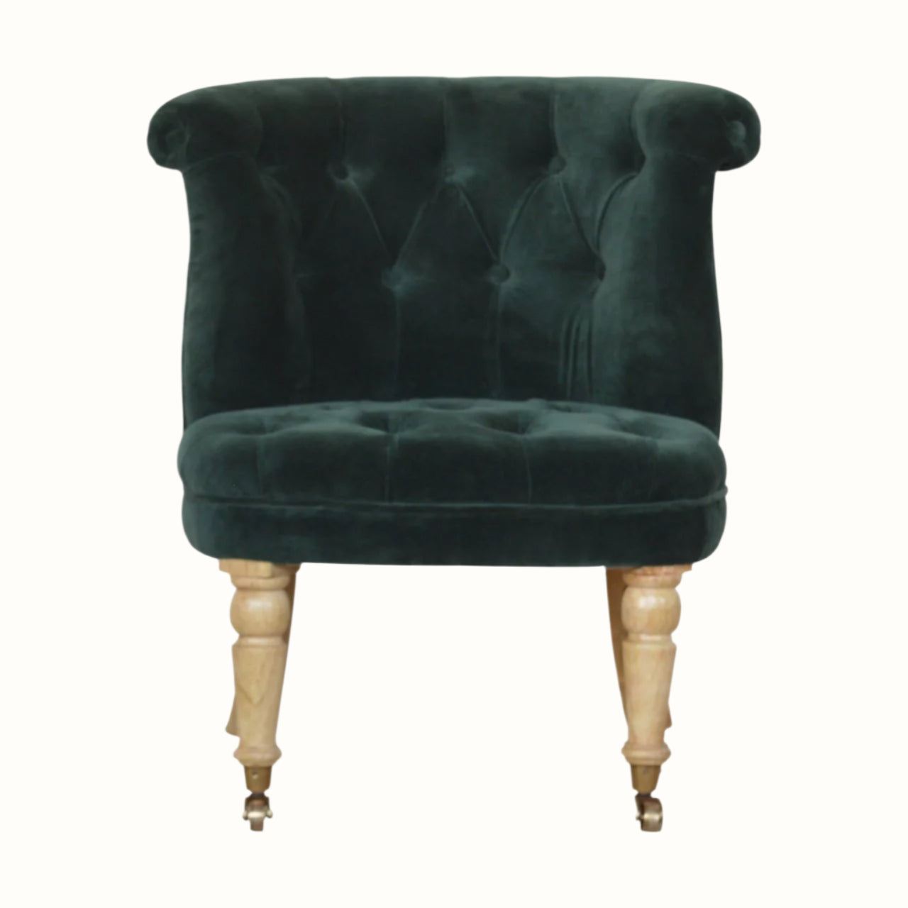 Antique style accent chair in green velvet, with light wood legs.