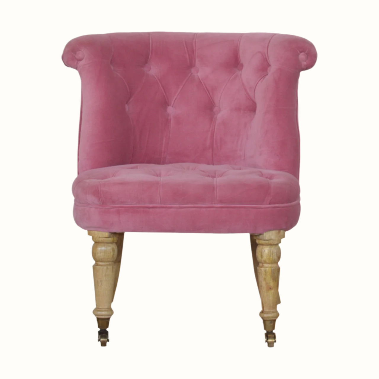 Vintage style seat in pink velvet, with light wood legs.