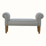 Vintage style bench in a grey fabric, with wooden legs.