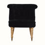 Vintage style seat in black velvet, with light wood legs.