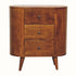 Curved cabinet, with three storage drawers, made from mango wood in a dark, chestnut brown stain. 
