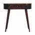 A curved console table with a light walnut finish, featuring a drawer with a brass knob and tapered legs.