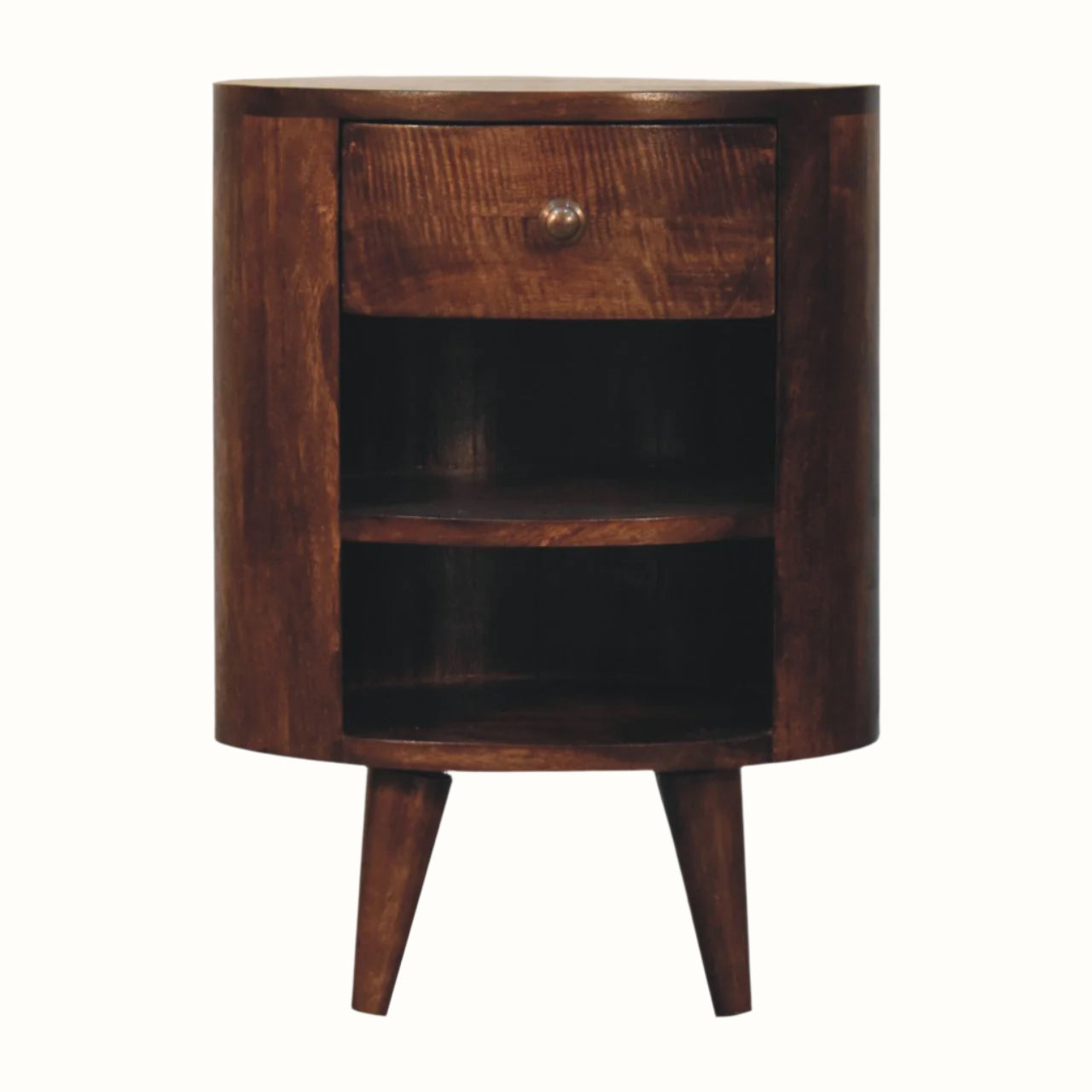 A bedside table with one drawer and two open shelves, handmade from mango wood in a dark brown, california walnut finish.