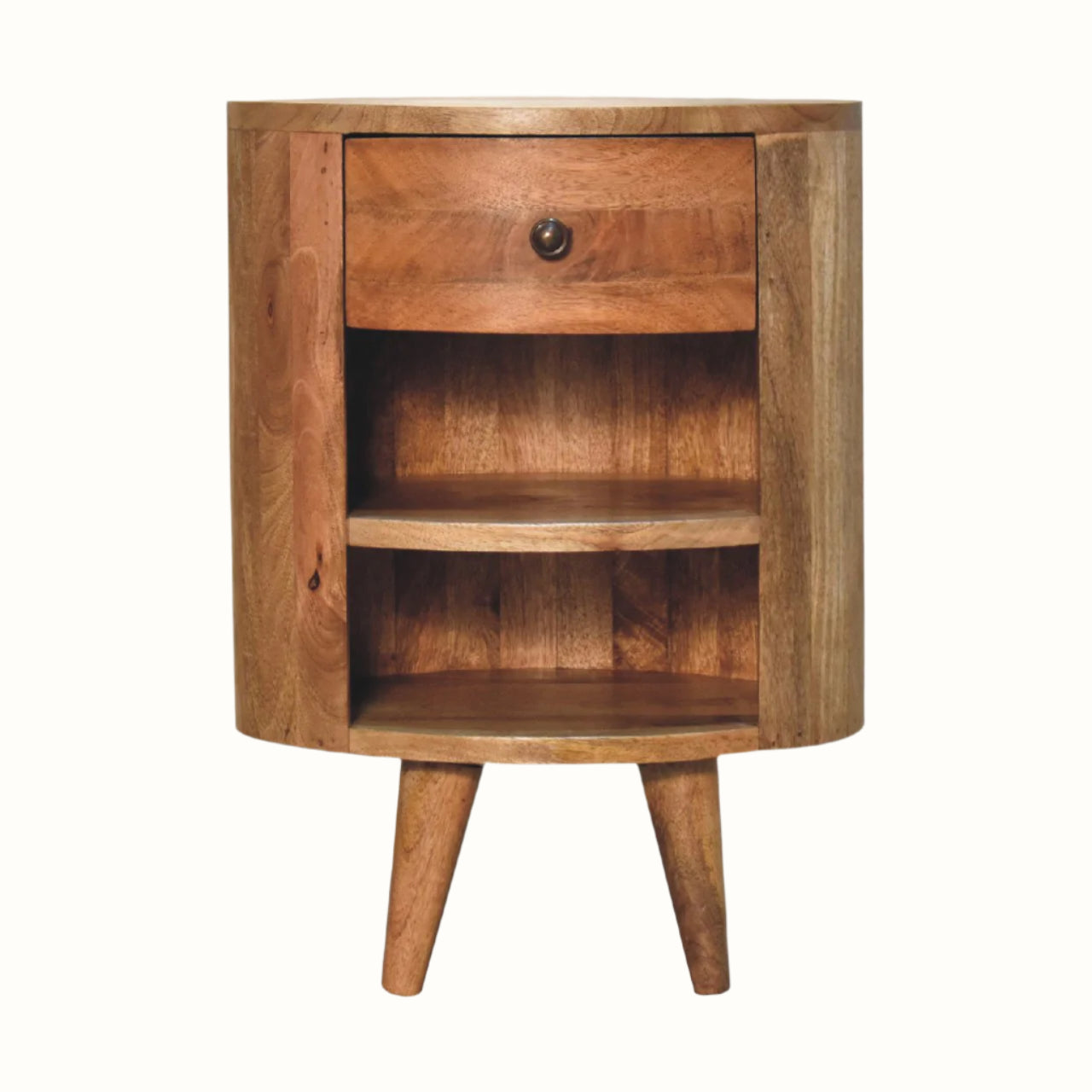 A curved bedside table, with 1 drawer and 2 open shelves, handmade from solid mango wood, in a natural finish.