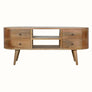 A curved TV stand featuring storage drawers and open shelving, made from wood.