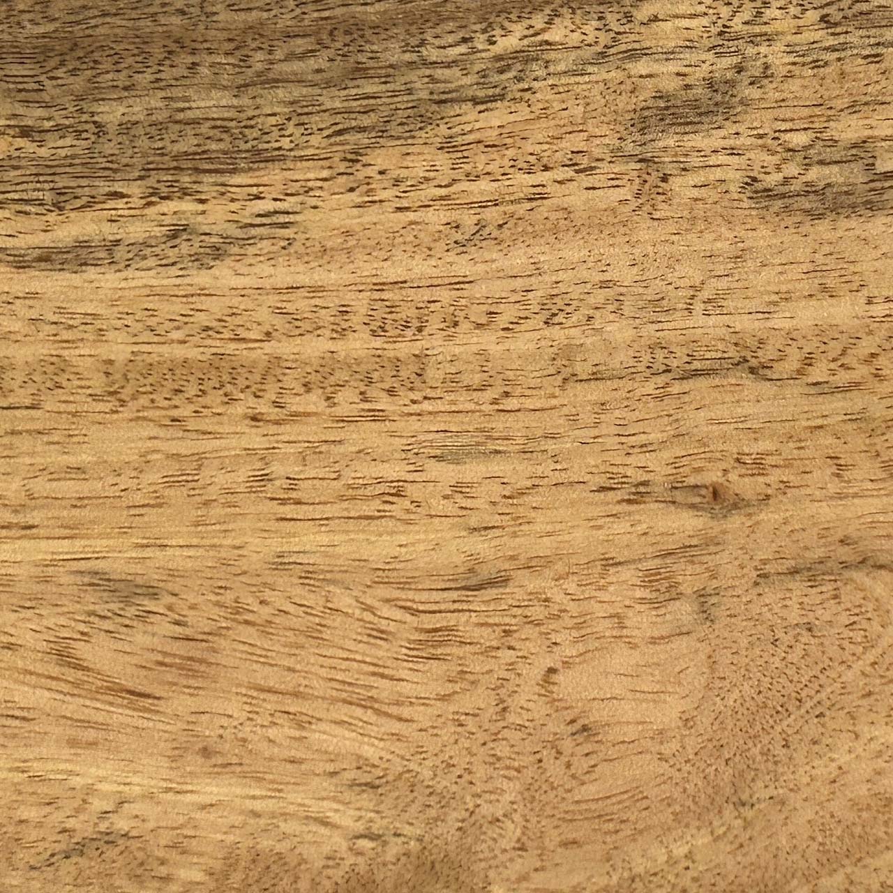 A close up photograph showing our natural mango wood sample.