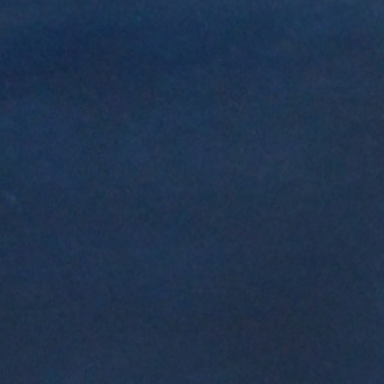A close up photograph showing our navy blue sample.
