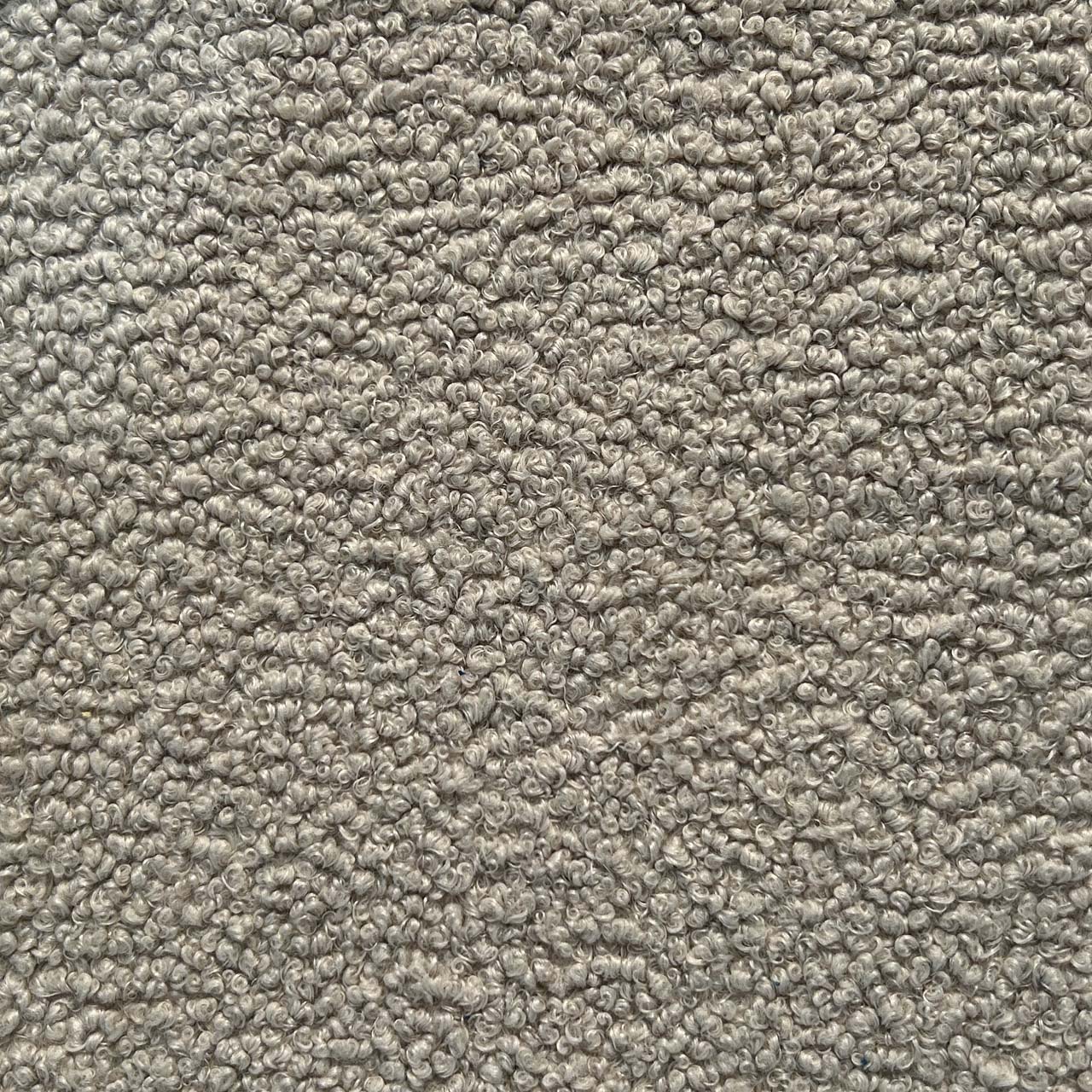 A close up photograph showing our oat boucle sample.