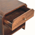 Wooden drawer with a brass handle on a white background
