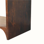 Close-up of a wooden shelf with a dark brown finish on a white background