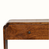 Wooden drawer with a metallic handle on a white background