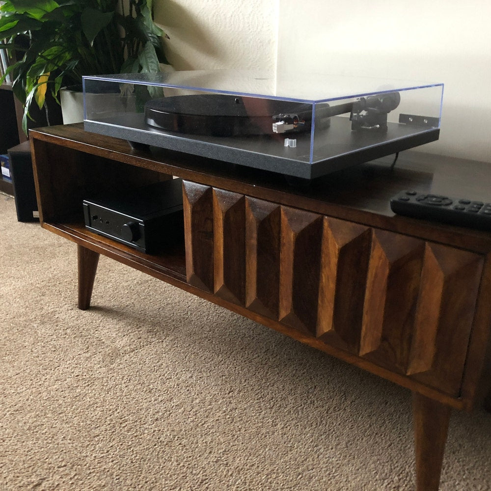 Chestnut coffee table with a record player stand on top, mid century modern style.