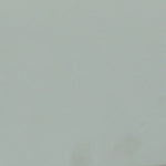 A close up photograph showing our sage green paint sample.