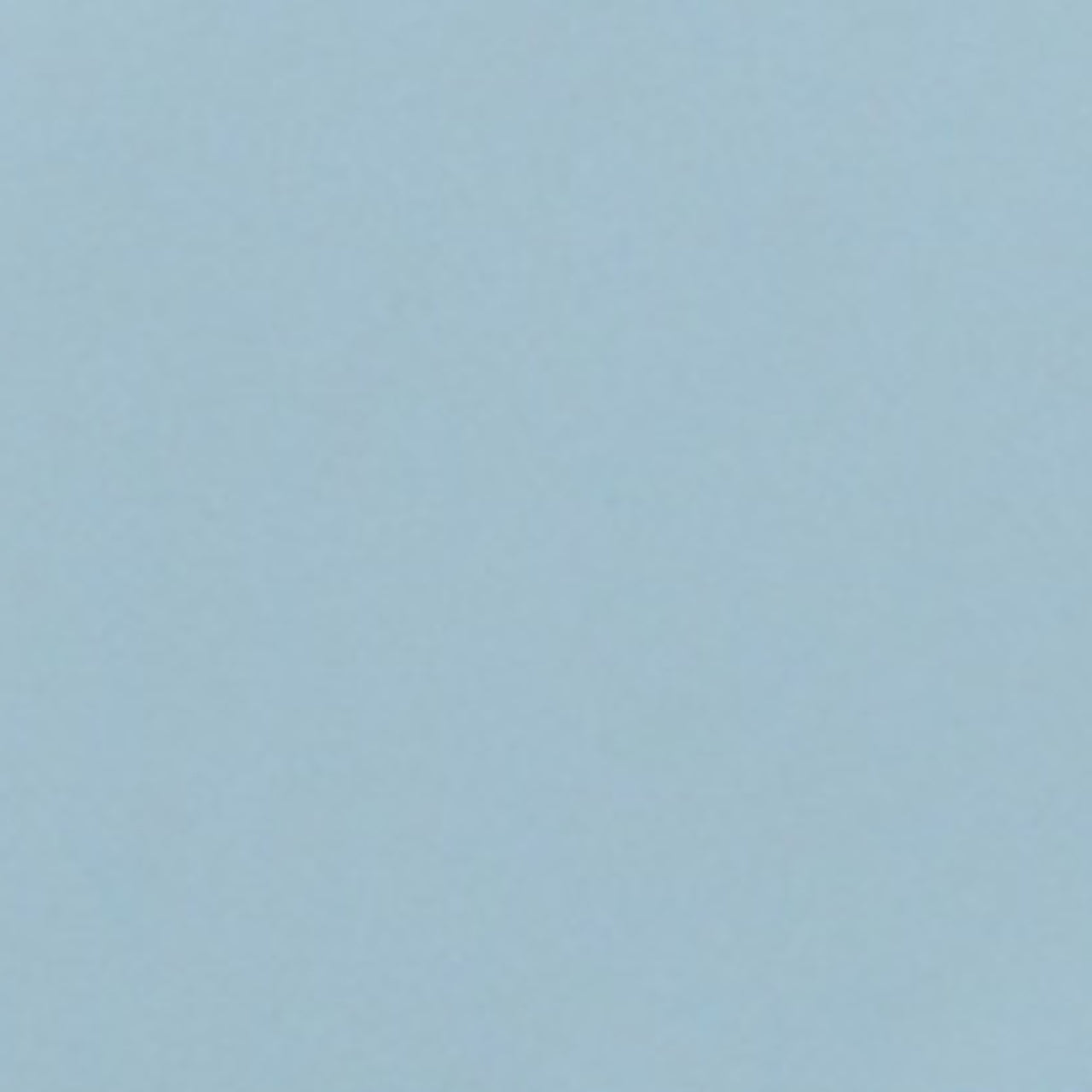 A close up photograph showing our sky blue paint sample.