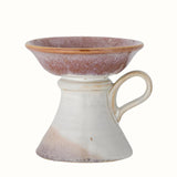 Stoneware pillar candle holder in pink and neutral glaze.
