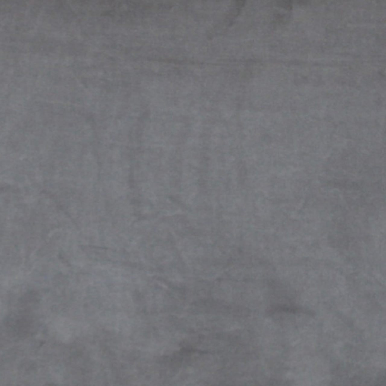 A close up photograph showing our stone grey velvet sample.