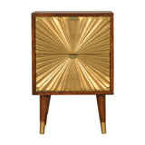 Wooden cabinet with gold sunburst design on a white background