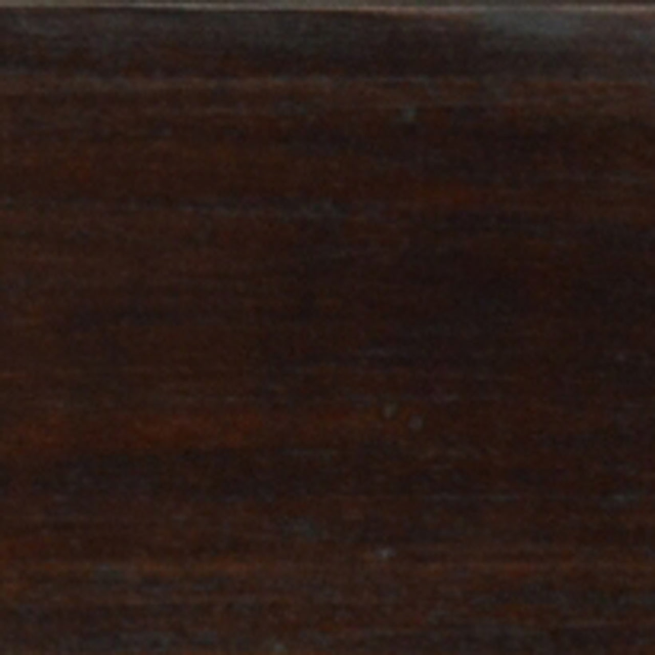 A close up photograph showing our walnut mango wood sample.