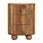 A natural finish mango wood bedside table with three drawers and chunky ball feet.