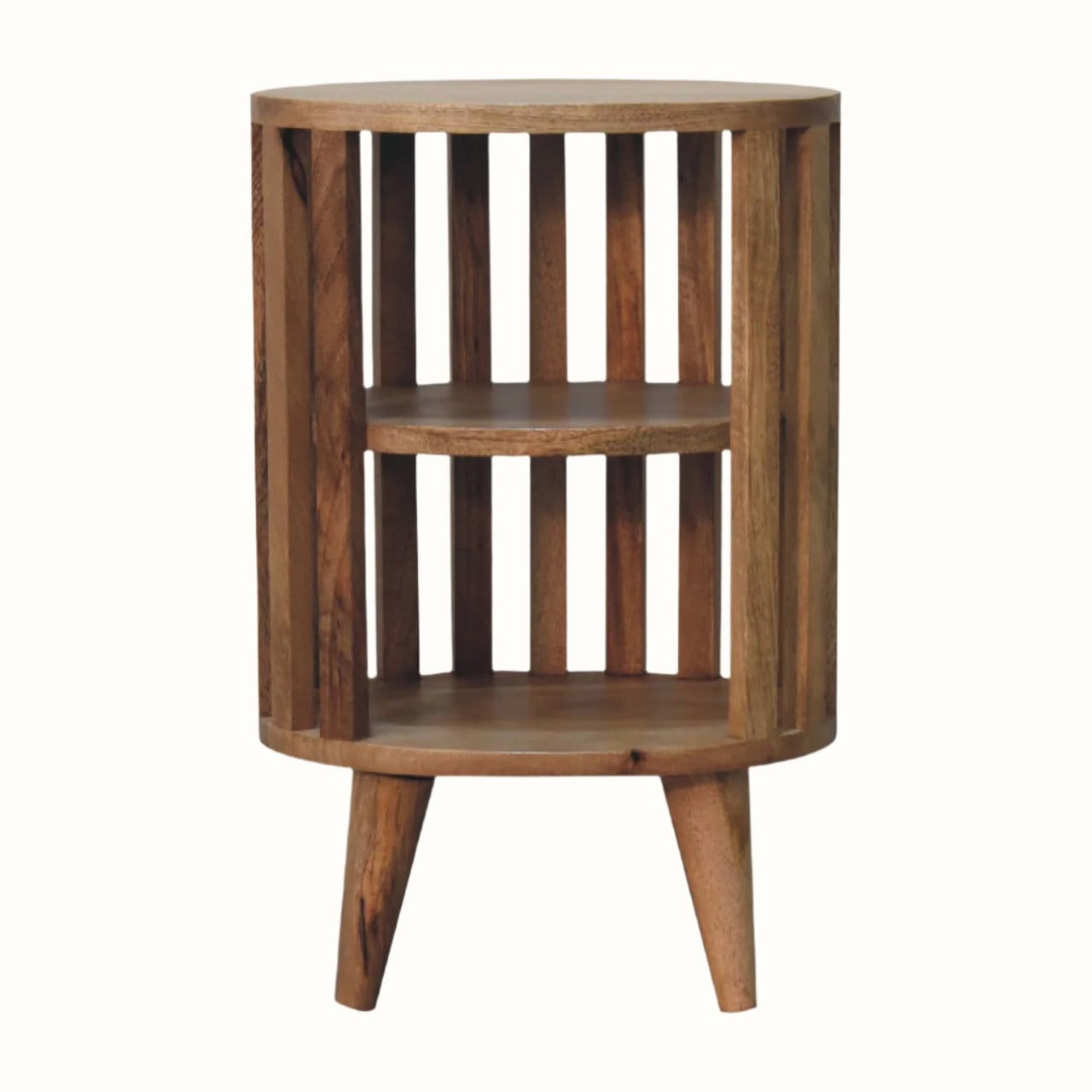 A natural finish mango wood bedside table with a slatted design and two open shelves.
