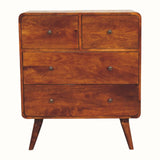 A Scandinavian-style chest of drawers made of solid mango wood with a chestnut finish, featuring four drawers with brass knobs and a visible record player surface.