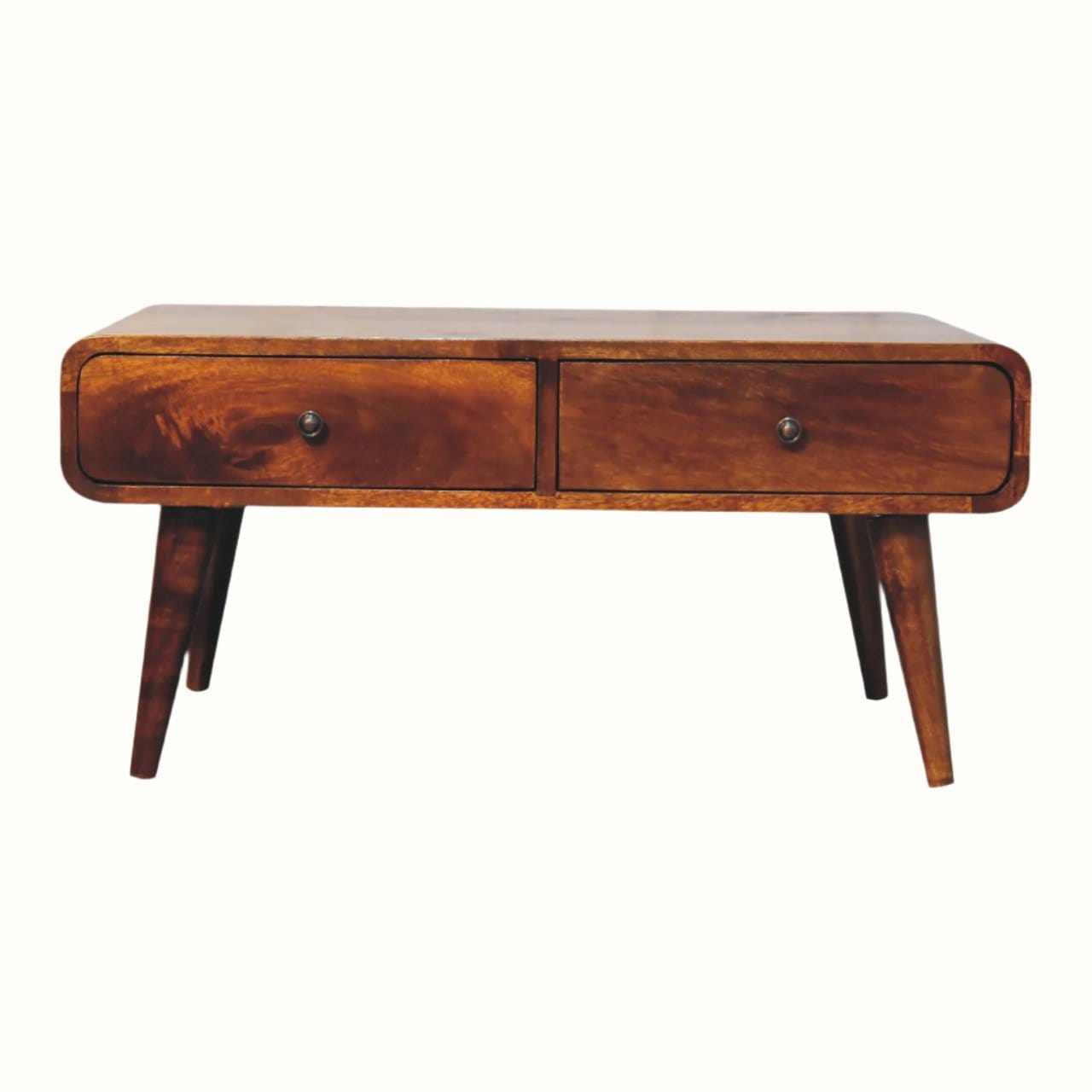 Curved coffee table, made from mango wood in dark brown finish, featuring storage drawers, brass knobs and tapered legs.
