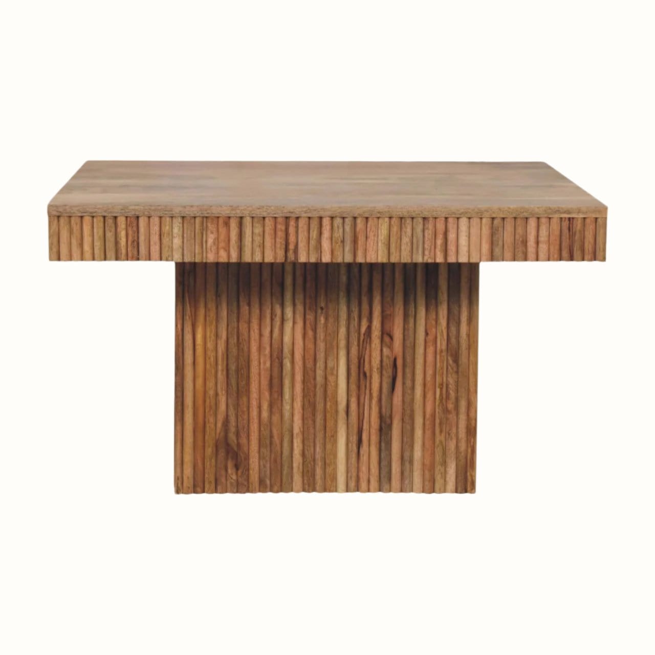 A rectangular coffee table made of solid mango wood with a natural finish and grooved lines carved on the surface.