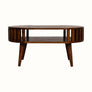 A chestnut stained wooden coffee table, featuring an open slot shelf, and slatted design.