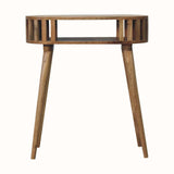 A natural finish mango wood console table with a slatted design and open slot shelf.